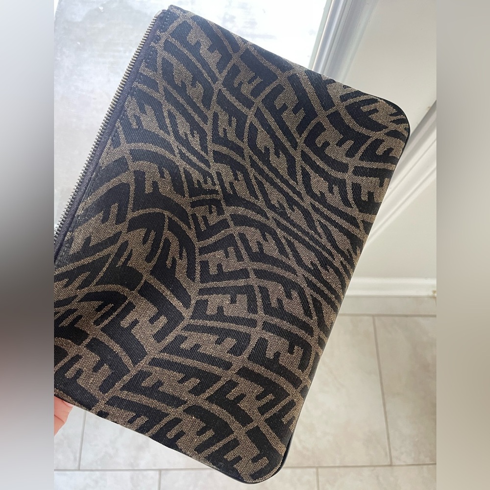 Authentic Fendi Medium FF Vertigo Motif Pouch.
Classic brown/black FF jacquard
